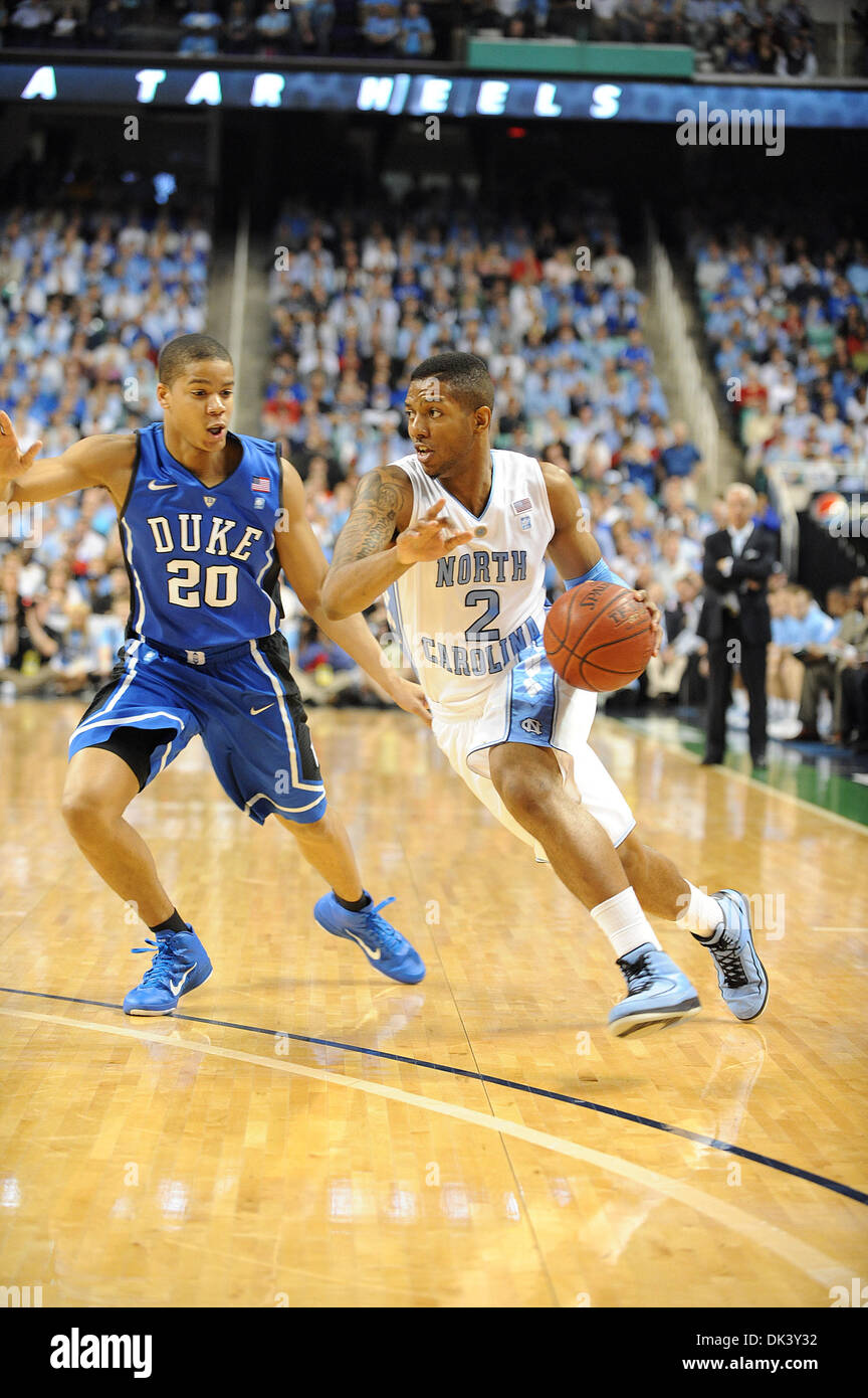 Mar 13, 2011 - Greensboro, North Carolina; USA - LESLIE MCDONALD (2) of the North  Carolina Tarheels drives to the basket as he is guarded by ANDRE DAWKINS  (20) of the Duke