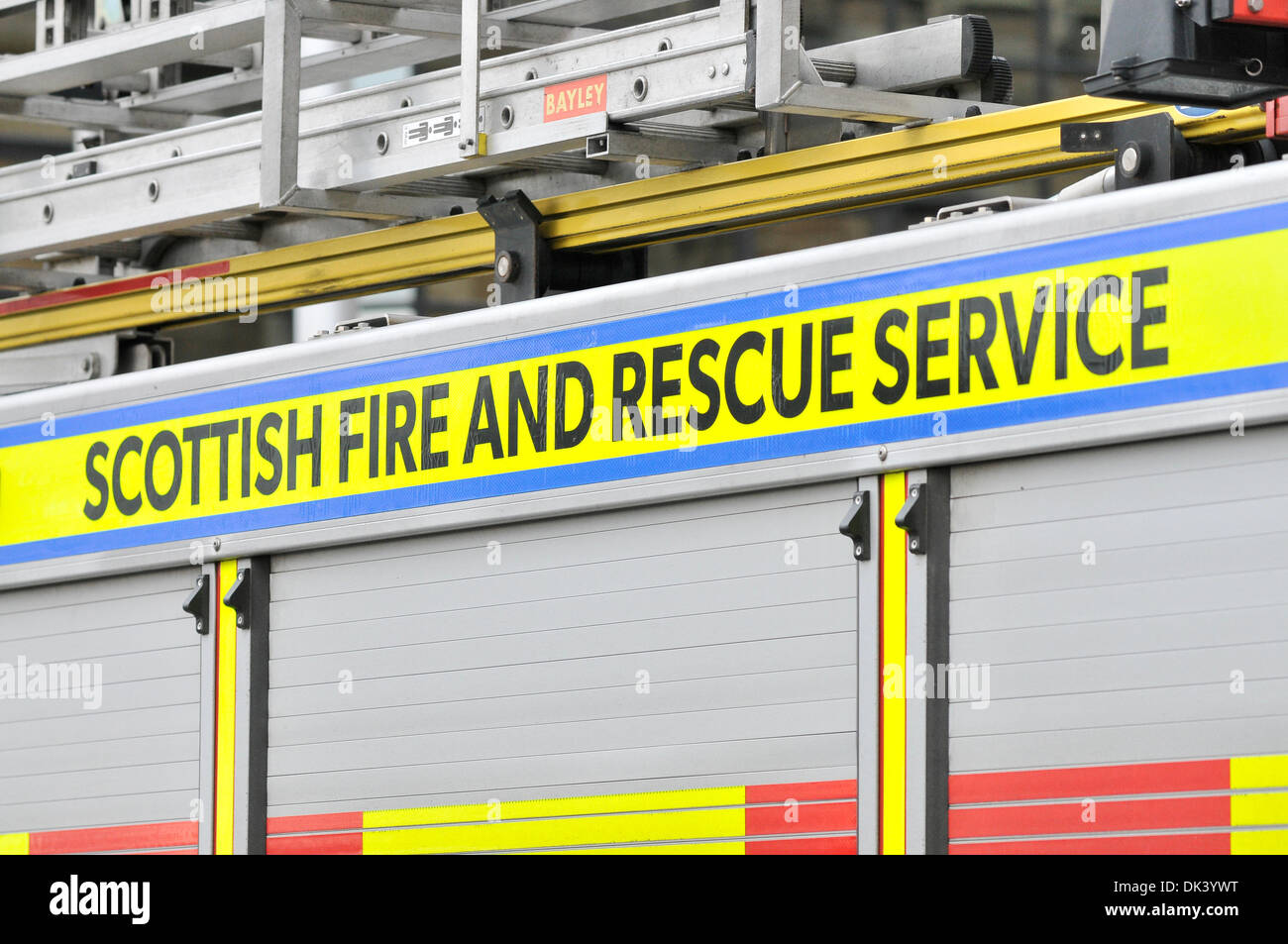 Image of the side of a fire engine with the logo 'Scottish Fire and Rescue Service'. Stock Photo