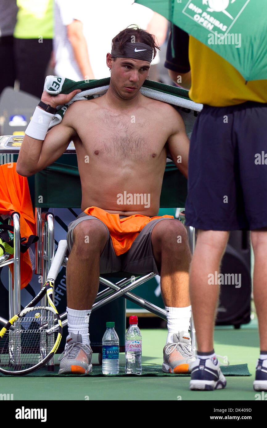 Mar. 14, 2011 - Indian Wells, California, U.S - Rafael Nadal (ESP) changes shirt during the men's third round match of the 2011 BNP Paribas Open held at the Indian Wells Tennis Garden in Indian Wells, California. Nadal won with a score of 6-3, 6-1  (Credit Image: © Gerry Maceda/Southcreek Global/ZUMAPRESS.com) Stock Photo