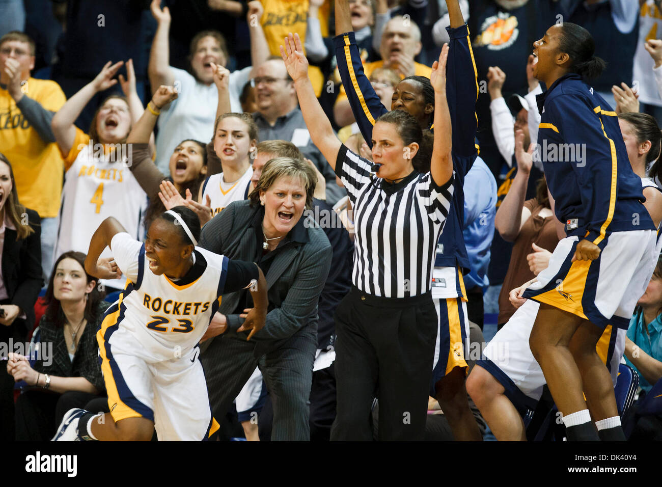 Mar. 16, 2011 - Toledo, Ohio, U.S - Toledo head coach Tricia Cullop, players, and fans celebrate guard Andola Dortch's (#22) game-winning three-pointer in the closing seconds of the game.  The Toledo Rockets, of the Mid-American Conference, defeated the Delaware Blue Hens, of the Colonial Athletic Association, 58-55 in the first round game of the 2011 Women's National Invitational  Stock Photo