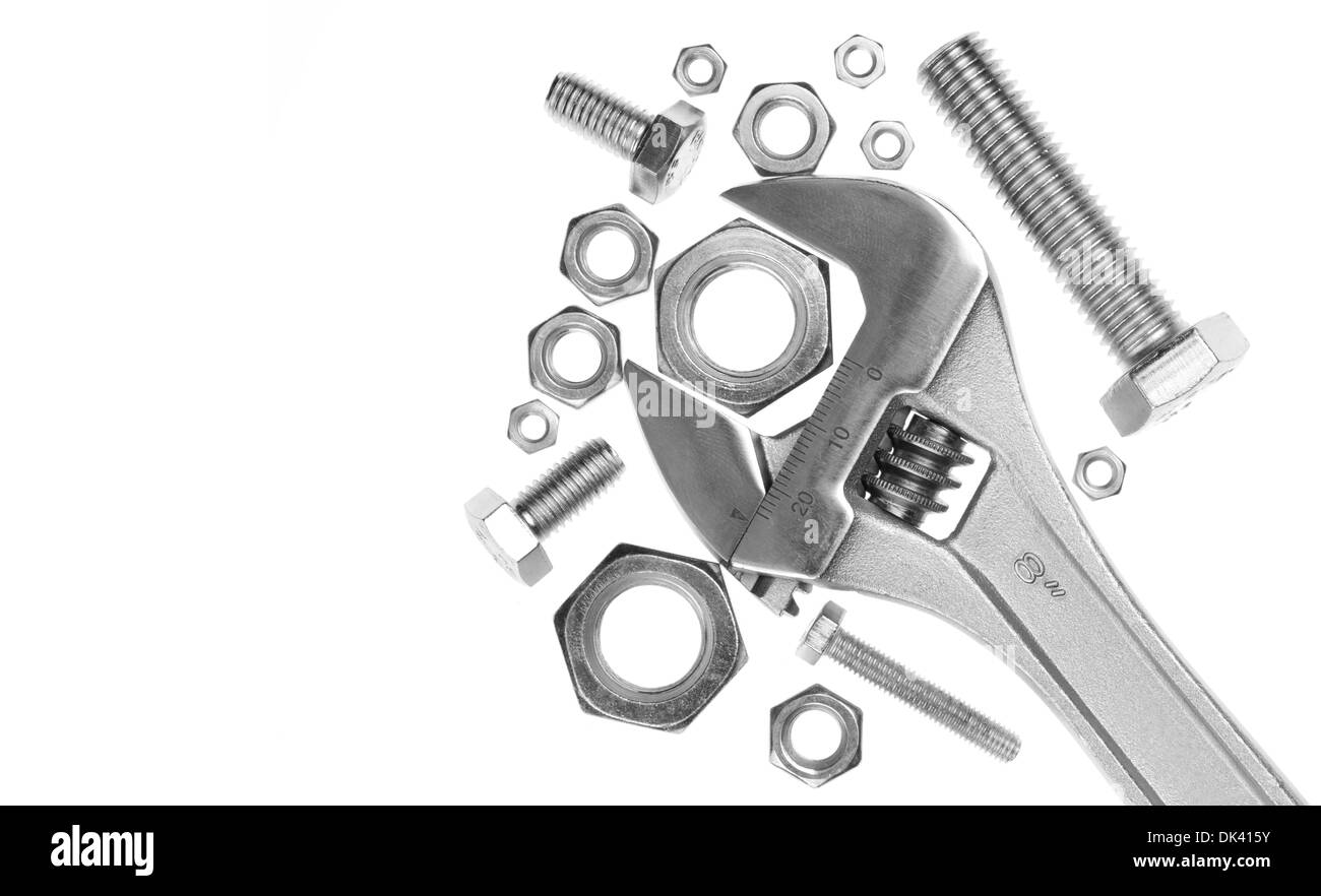 Adjustable wrench with nuts and screws Stock Photo