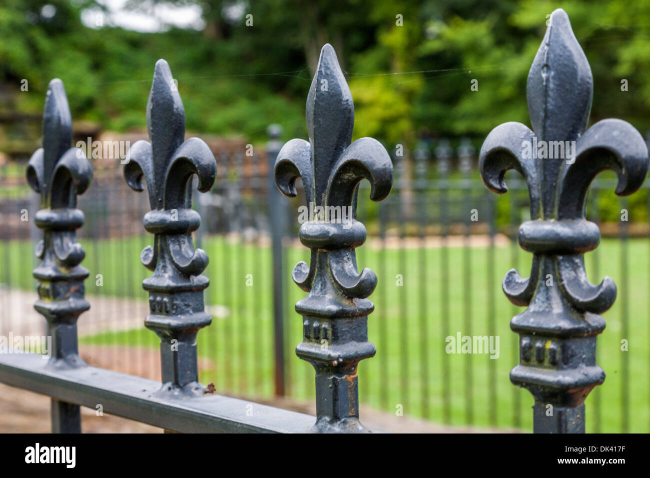 Fleur-de-lis pattern on top of wrought Iron fence at Spring Park in Tuscumbia, Alabama Stock Photo