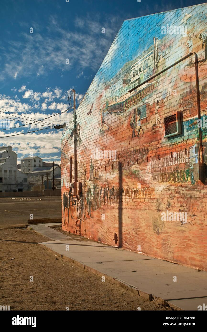 Borax chemical plant and History Mural on building in Trona, California Stock Photo