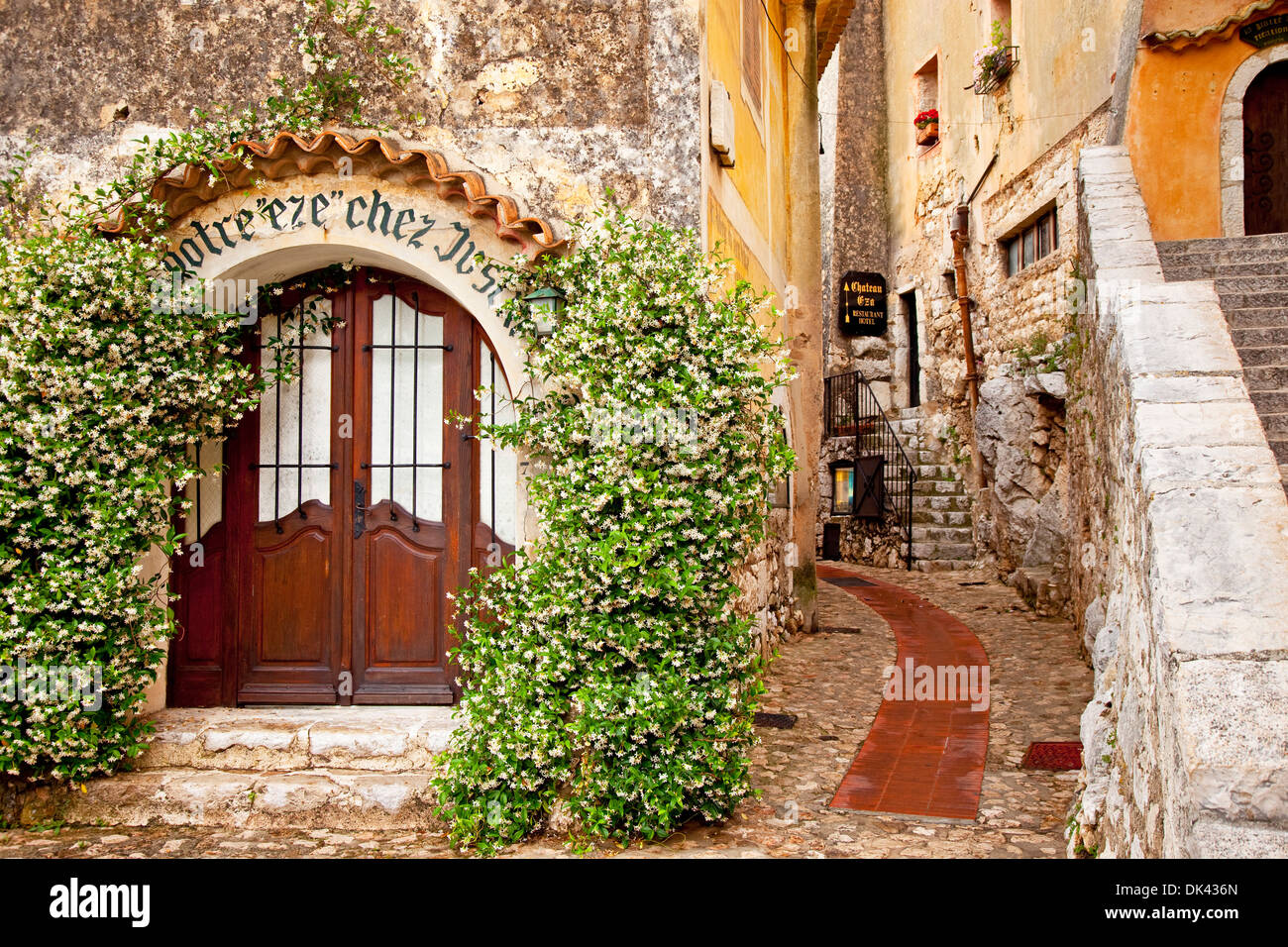 Jasmine covered entryway to shop in ancient town of Eze, Provence France Stock Photo