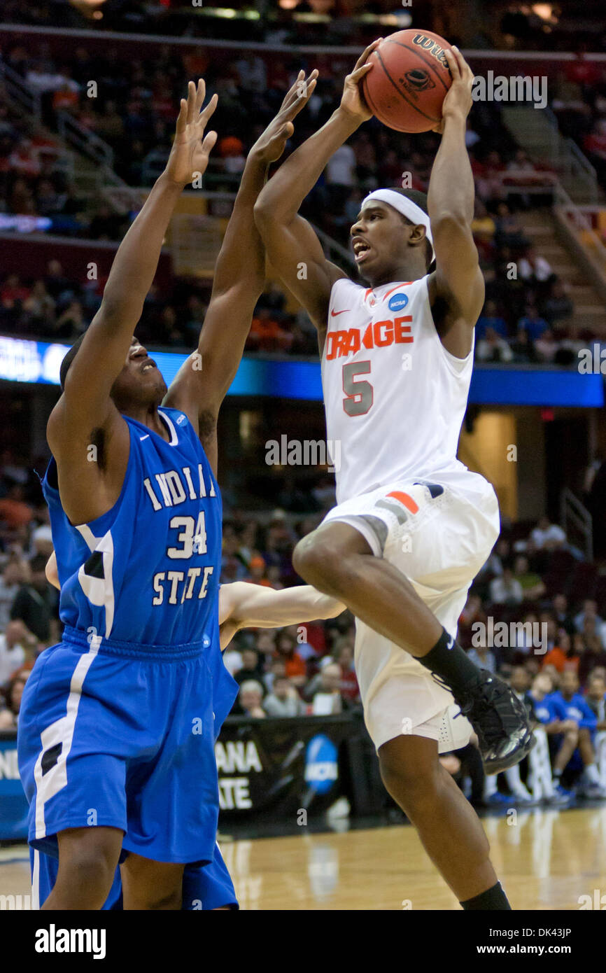 Mar. 19, 2011 - Cleveland, Ohio, U.S - Syracuse forward C.J. Fair (5) goes to the basket against Indiana State center Myles Walker (34) in the second half.  The Syracuse Orange defeated the Indiana State Sycamores 77-60 at Quicken Loans Arena. (Credit Image: © Frank Jansky/Southcreek Global/ZUMAPRESS.com) Stock Photo