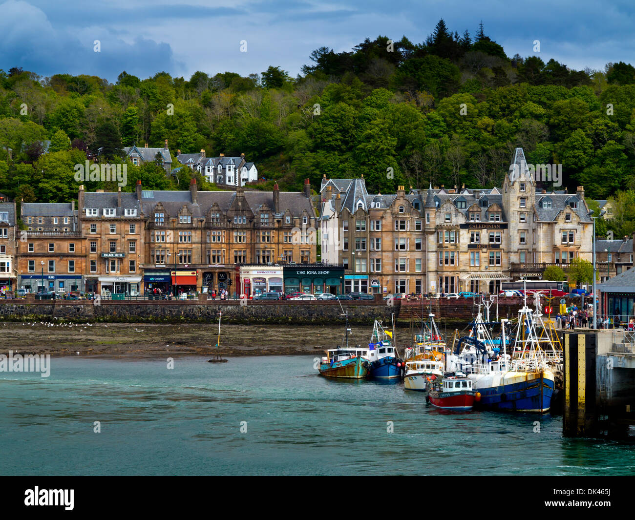 View across the seafront at Oban in Argyll and Bute Scotland UK a resort town with boats in the harbour below Stock Photo