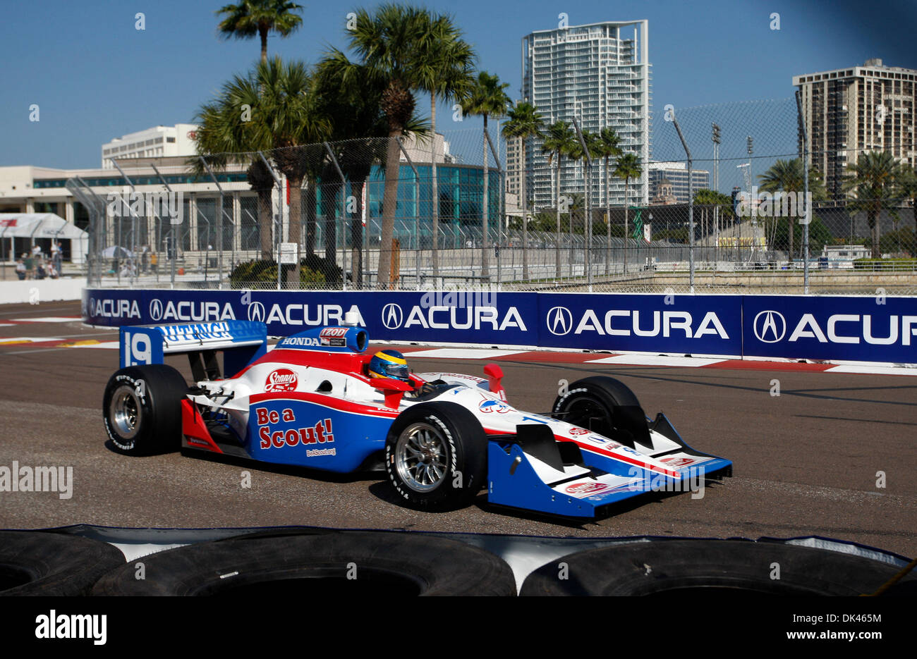 Mar. 25, 2011 - St. Pete, FL - DIRK SHADD   |  Times .SP 336219 SHAD GRANDPRIX 02 (03/25/11 ST. PETE) IndyCar driver Sebastien Bourdais (car 19), with Dale Coybe Racing, makes his way through turn 10 with the Mahaffey Theater and the city of St. Petersburg in the background during the IndyCar morning practice on the opening day of the Honda Grand Prix of St. Petersburg Friday (03/2 Stock Photo