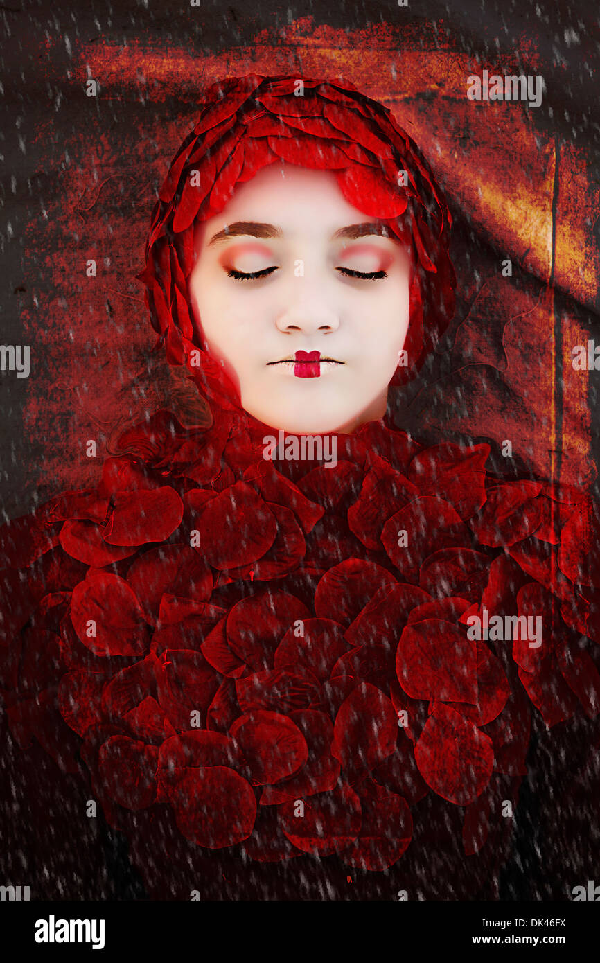 Girl dressed in Red  Rose Pedals Stock Photo