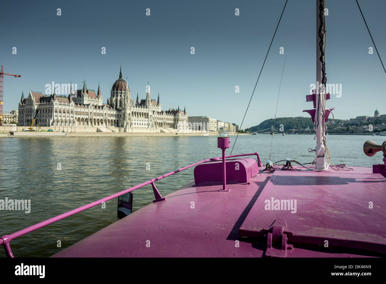 Cruising up the river Danube, Budapest, with the Hungarian Parliament building in the distance Stock Photo