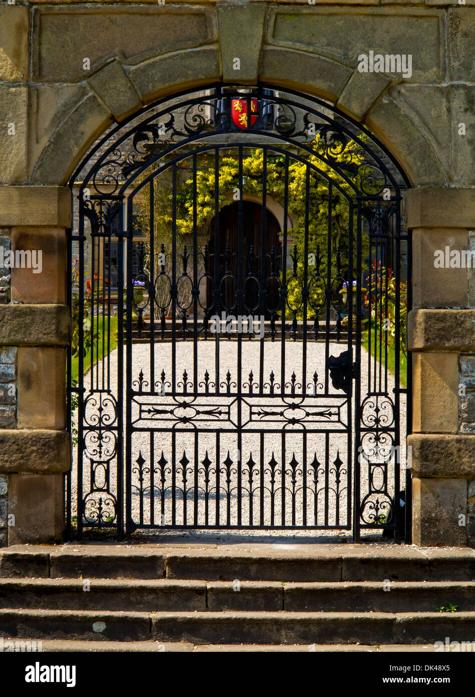 Wrought iron entrance gates at Tissington Hall Derbyshire England UK a