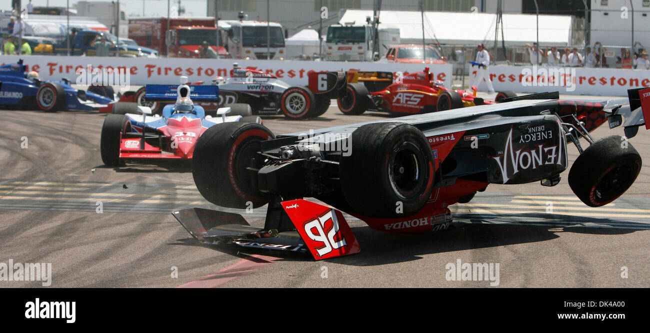 Mar. 27, 2011 - St. Petersburg, Florida, U.S. - MARCO ANDRETTI's car spins upside-down during a first turn accident on lap one of the Honda Grand Prix of St. Petersburg Sunday. Several big name drivers were involved in the accident including Scott Dixon, Mike Conway, Helio Castroneves and Ryan Briscoe. (Credit Image: © Bruce Moyer/St. Petersburg Times/ZUMAPRESS.com) Stock Photo