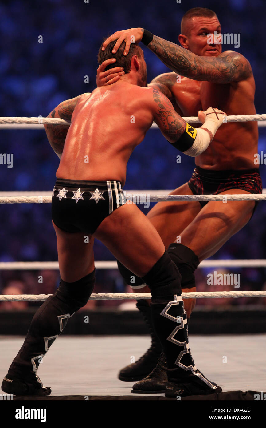 Apr 03, 2011 - Atlanta, Georgia, U.S. - RANDY ORTON attempts to drive CM Punk's face into the top turnbuckle. (Credit Image: © Matt Roberts/ZUMAPRESS.com) Stock Photo