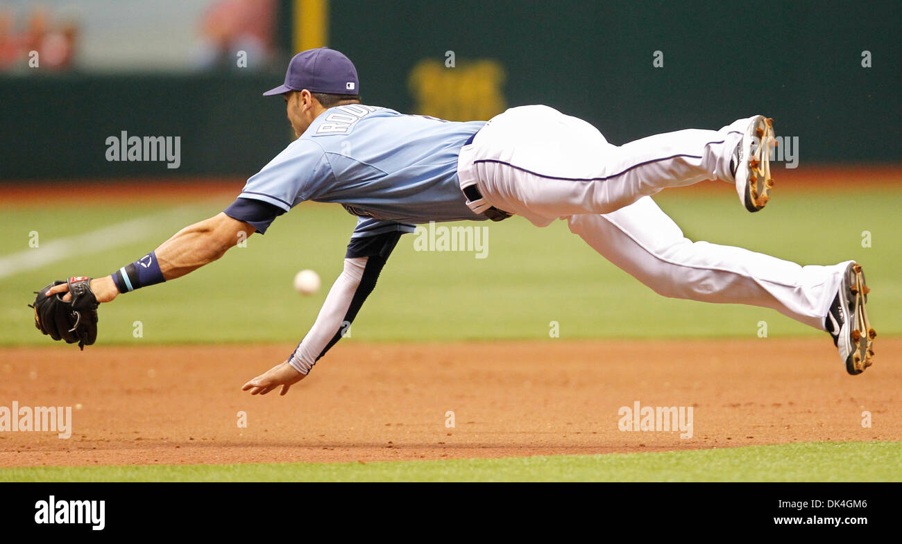 Apr. 3, 2011 - St. Petersburg, FL, USA - JAMES BORCHUCK  |   Times.SP 335878 BORC rays (04/03/11) (St. Petersburg, FL) Sean Rodriguez dives in vain for a J.J. Hardy RBI double down the left field line which scored two runs in the seventh during the Rays game against the Baltimore Orioles at Tropicana Field Sunday, April 3, 2011.   [JAMES BORCHUCK, Times] (Credit Image: © St. Peters Stock Photo