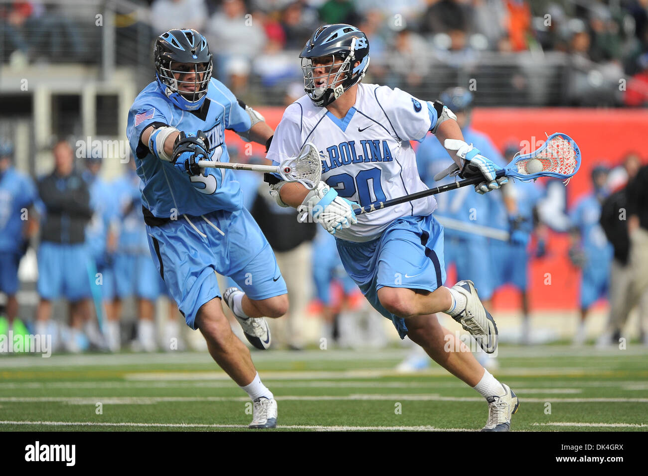 Apr. 3, 2011 - East Rutherford, New Jersey, U.S - Johns Hopkins Blue Jays Goalkeeper Guy Van (37) and UNC Tar Heels Midfielder Jimmy Dunster (20) in action during the Konica Minolta Big City Classic at The New Meadowlands Stadium in East Rutherford New Jersey Johns Hopkins X UNC X to X at the half (Credit Image: © Brooks Von Arx/Southcreek Global/ZUMAPRESS.com) Stock Photo