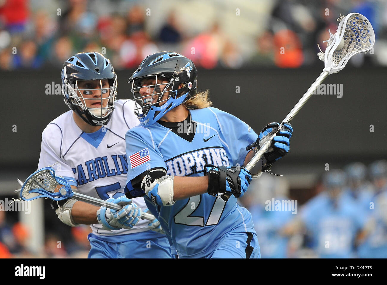 Apr. 3, 2011 - East Rutherford, New Jersey, U.S - UNC Tar Heels Midfielder Chris Hunt (5) and Johns Hopkins Blue Jays Midfielder Rob Guida (27) in action during the Konica Minolta Big City Classic at The New Meadowlands Stadium in East Rutherford New Jersey  Johns Hopkins defeats UNC 10 to 9 (Credit Image: © Brooks Von Arx/Southcreek Global/ZUMAPRESS.com) Stock Photo