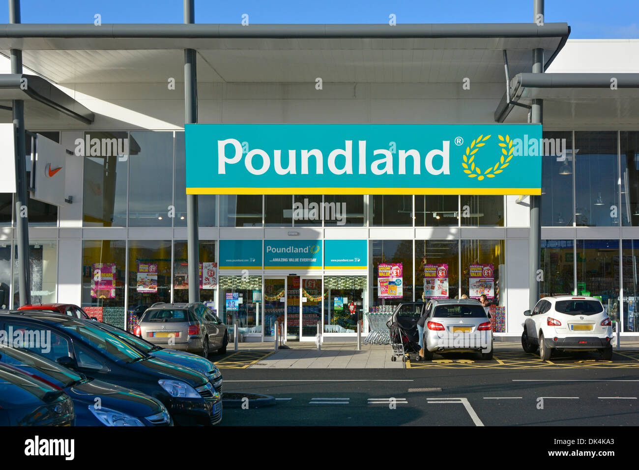 Poundland store shop front in a retail park with free car parking close to the entrance in Junction Retail Park Thurrock Essex England UK Stock Photo