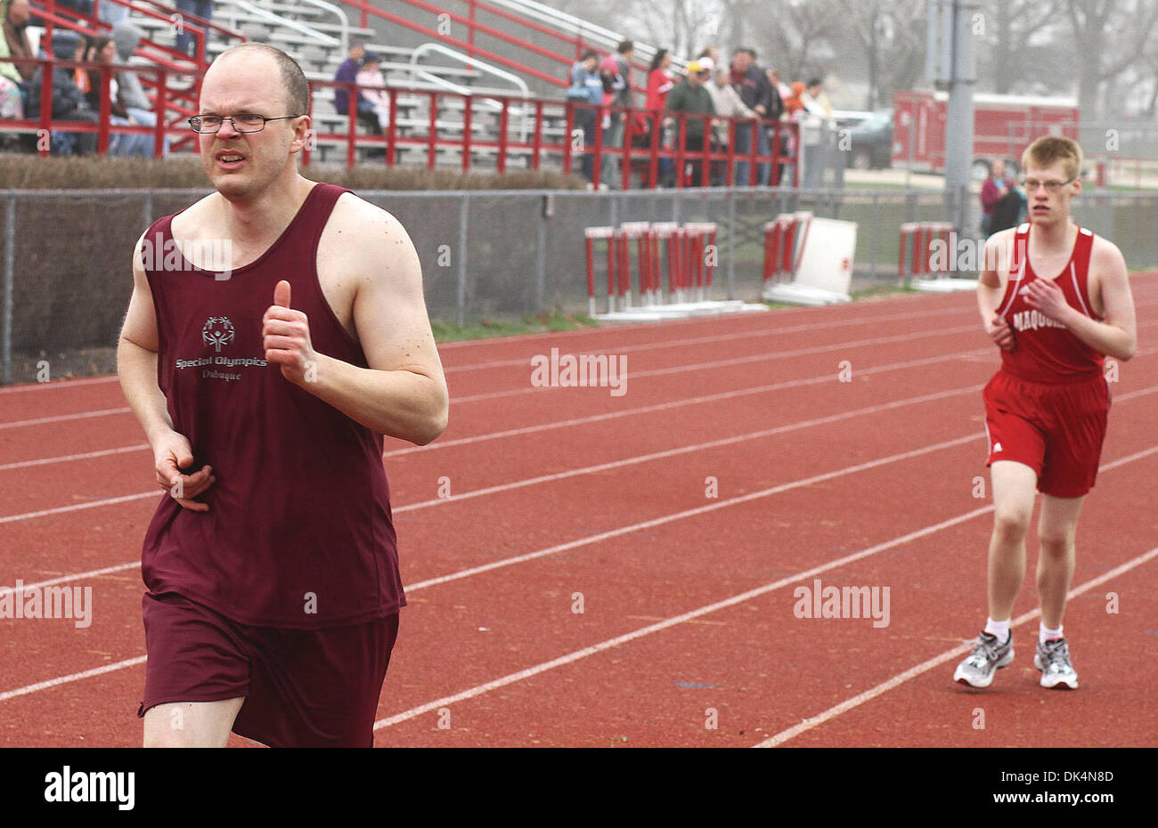 Apr. 9, 2011 Iowa, U.S. Shannon Hickey and Eric Davis run the 1,500