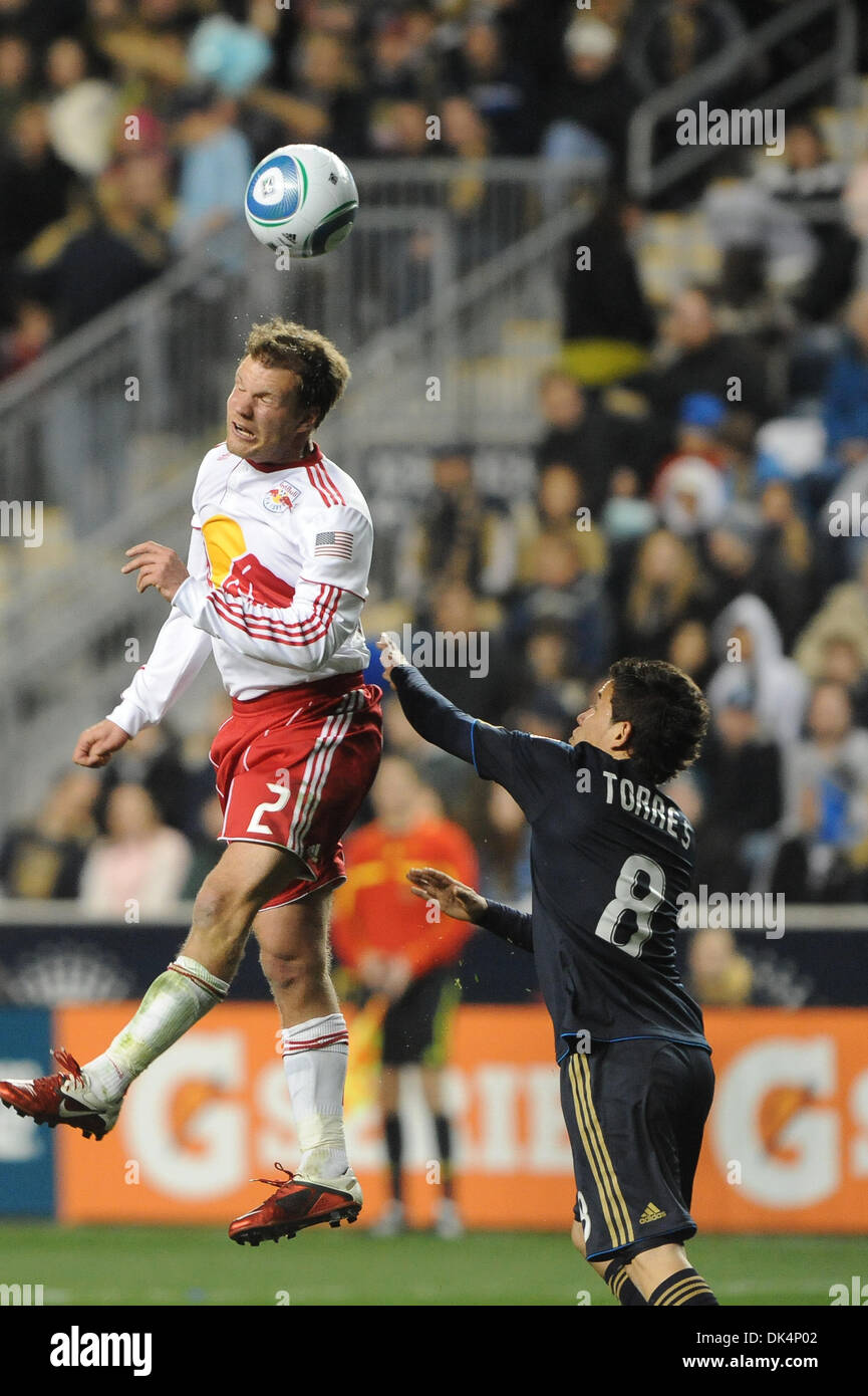 Apr. 9, 2011 - Chester, Pennsylvania, U.S - New York Red Bulls defender/midfielder Teemu Tainio (2) heads the ball over Philadephia Union midfielder Roger Torres (8). The Philadelphia Union defeats the New York Red Bulls 1-0,  in a game being played at PPL Park in Chester, Pennsylvania (Credit Image: © Mike McAtee/Southcreek Global/ZUMAPRESS.com) Stock Photo