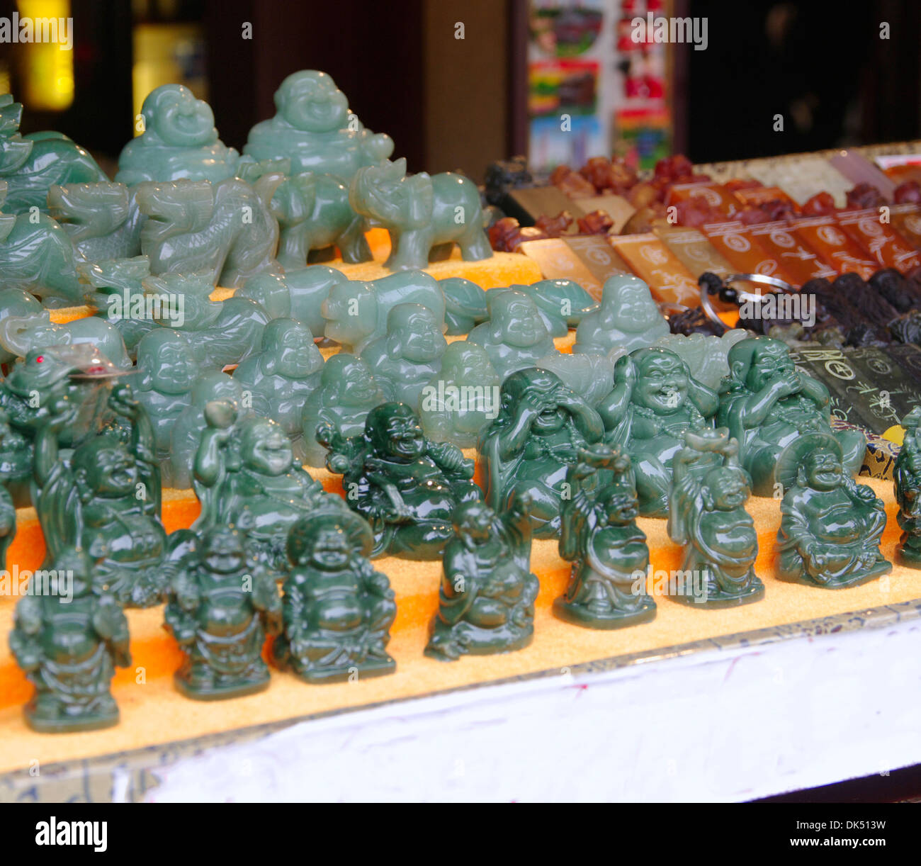 jade figurines Buddhas put up for sale (see no, hear no, I will not tell) Shanghai China 14.11.2013 Stock Photo
