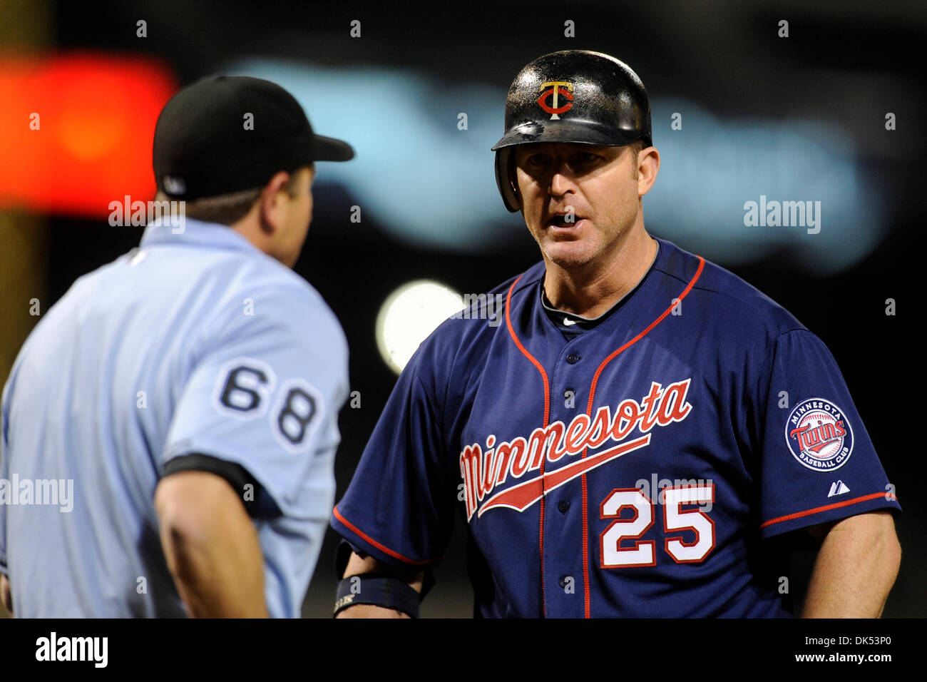 Apr. 18, 2011 - Baltimore, Maryland, U.S - Minnesota Twins DH Jim Thome (25) argues with home plate umpire Chris Guccione after a called strike 3 during a game between the Baltimore Orioles and the Minnesota Twins, the Twins defeated the Orioles 5-3 (Credit Image: © TJ Root/Southcreek Global/ZUMApress.com) Stock Photo