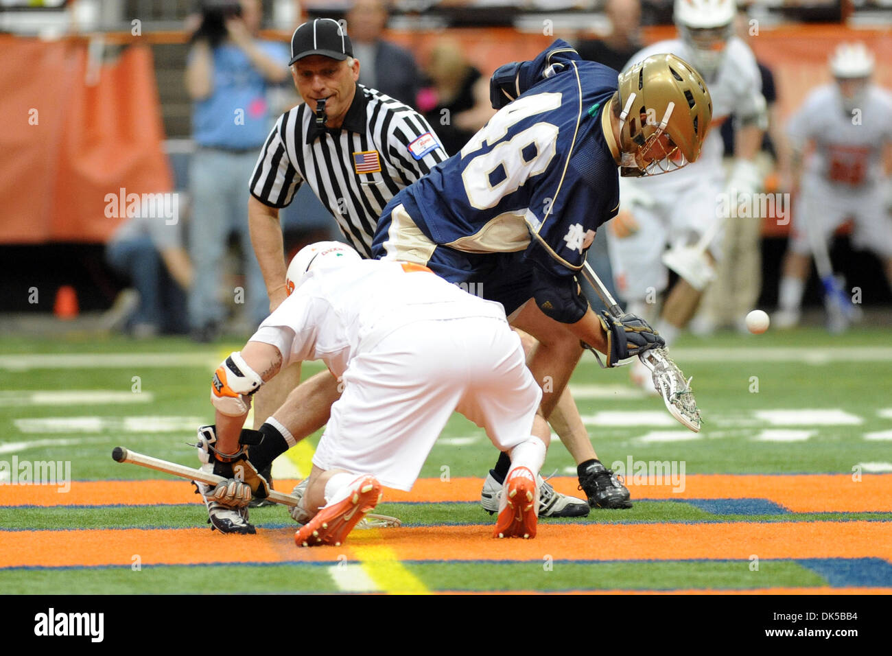 April 30, 2011 - Syracuse, New York, U.S - Notre Dame Fighting Irish midfielder Liam O'Connor (48) wins the first quarter face-off against Syracuse Orange midfielder Chris Daddio (1). Syracuse Orange leads the top ranked Notre Dame Fighting Irish 6-3 at the half at the Carrier Dome in Syracuse, NY. (Credit Image: © Michael Johnson/Southcreek Global/ZUMAPRESS.com) Stock Photo