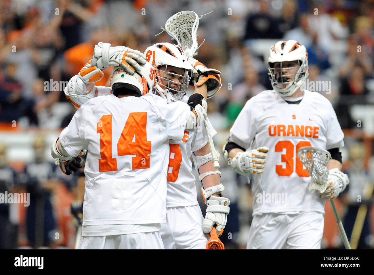 May 1, 2011 - Syracuse, New York, U.S - Syracuse Orange attackman Stephen Keogh (28) celebrates the first quarter goal with teammate Syracuse Orange attackman Tom Palasek (14) against the Notre Dame Fighting Irish. Syracuse defeated top ranked Notre Dame 11-8 at the Carrier Dome in Syracuse, NY. (Credit Image: © Michael Johnson/Southcreek Global/ZUMAPRESS.com) Stock Photo
