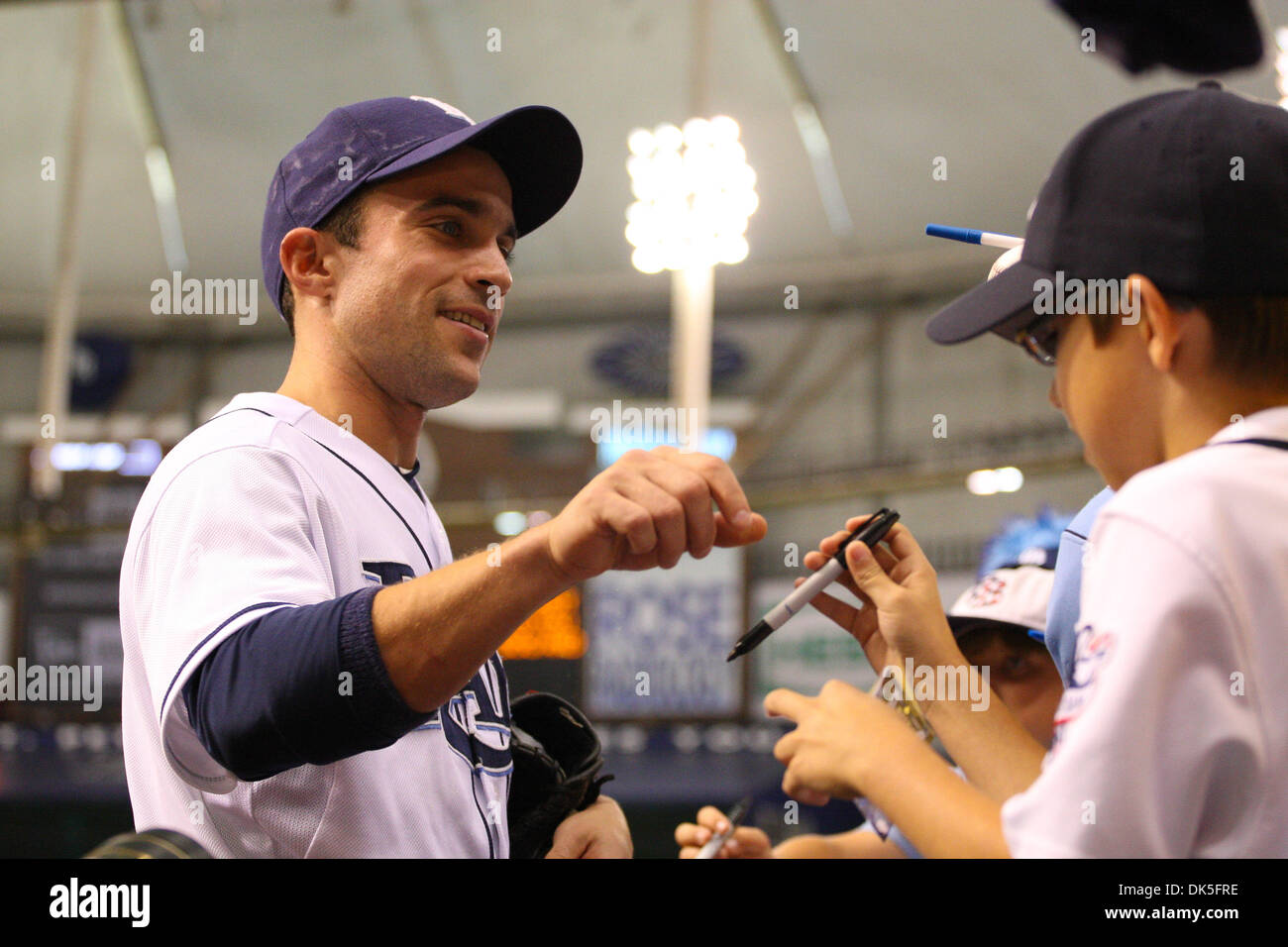 May 4, 2011 - St.Petersburg, Florida, U.S - Tampa Bay Rays left fielder Sam Fuld (5) signs for fans prior to the match up between the Tampa Bay Rays and the Toronto Blue Jays at Tropicana Field. (Credit Image: © Luke Johnson/Southcreek Global/ZUMApress.com) Stock Photo