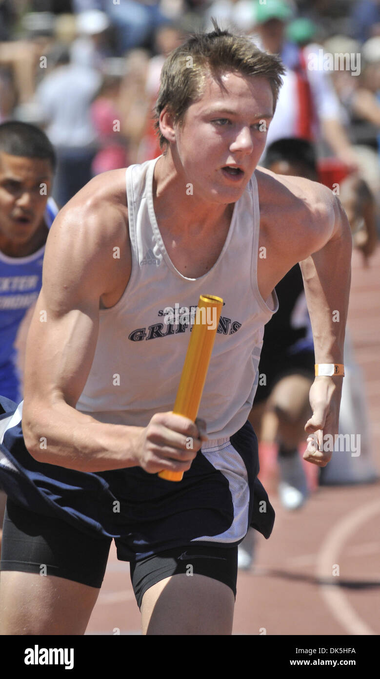 May 7, 2011 - Albuquerque, NM, U.S. - Greg Sorber -- Santa Fe Prep's Kevin Lowe bursts out of the blocks in the first leg of the Class A 4 x 100 meter relay which Prep won in 44.35 at the 2011 New Mexico State Track and Field Championships at UNM on Saturday, May 7, 2011. (Credit Image: © Greg Sorber/Albuquerque Journal/ZUMAPRESS.com) Stock Photo