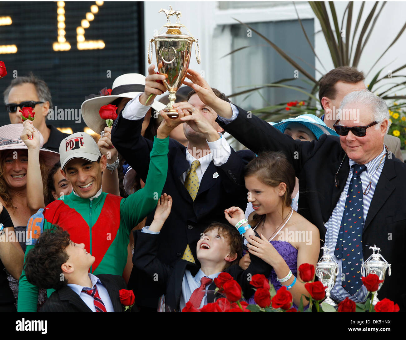May 7, 2011 - Louisville, Ky, USA - Animal Kingdom owner Barry Irwin with with Team Valor International, right, jockey John R. Velazquez, left, and trainer H. Graham Motion, hold the trophy after winning the 137th running of the Kentucky Derby on Saturday, May 7, 2011, at Churchill Downs in Louisville, Ky. Photo by Charles Bertram | Staff (Credit Image: © Lexington Herald-Leader/ZU Stock Photo