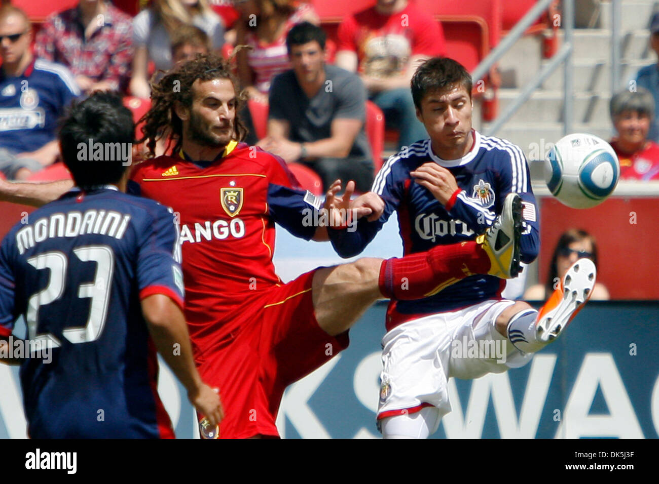 May 7, 2011 - Sandy, Utah, U.S - Real Salt Lake midfielder Kyle Beckerman (5) goes for a 50-50 ball against the Chivas midfielders in Rio Tinto Stadium Saturday afternoon. (Credit Image: © Stephen Holt/Southcreek Global/ZUMAPRESS.com) Stock Photo