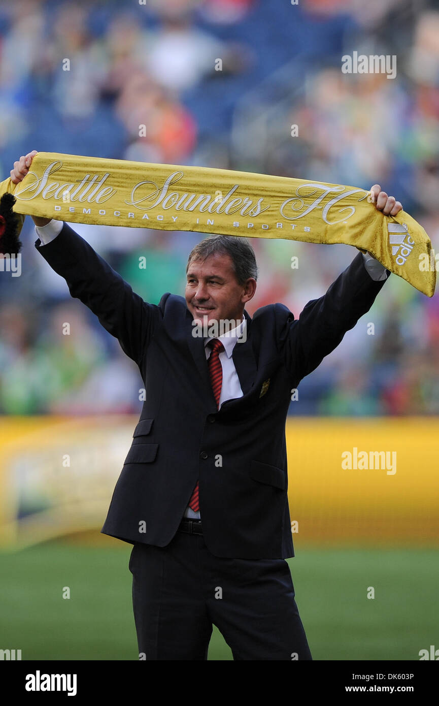 July 20, 2011 - Seattle, Washington, United States of America - Bryan Robson receive the Golden Scarf from Seattle Sounders FC owner, Joe Roth during pre-game of Manchester United vs. Seattle Sounders FC in an International Friendly during United's U.S. preseason tour. (Credit Image: © Chris Coulter/Southcreek Global/ZUMApress.com) Stock Photo