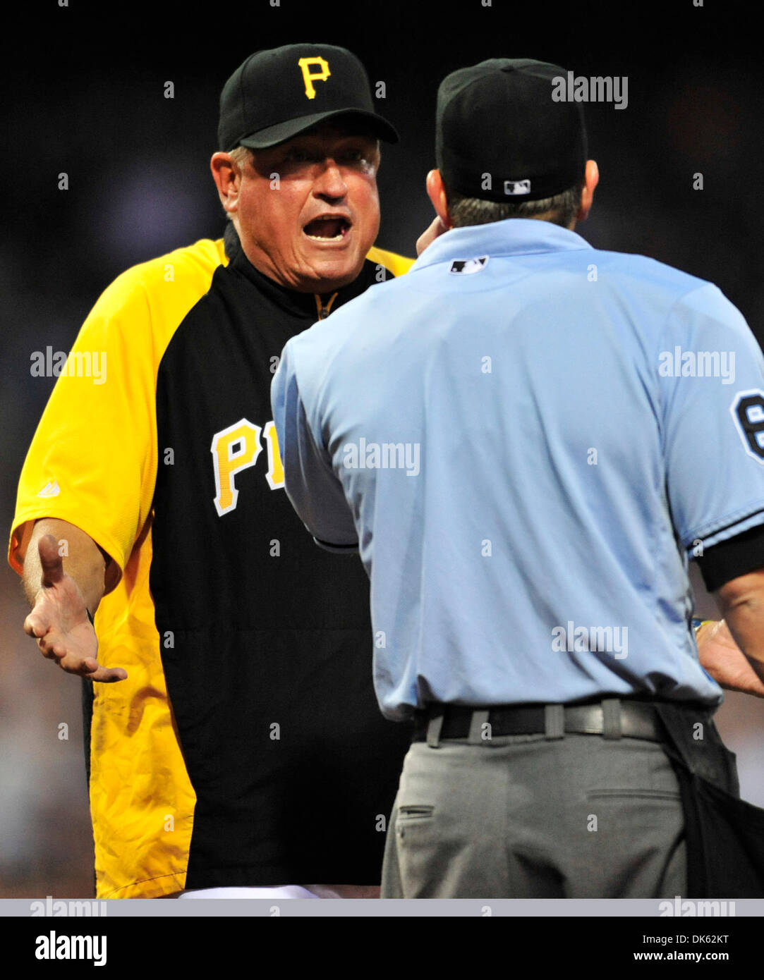 May 21, 2011 - Pittsburgh, Pennsylvania, U.S - 21 May 2011: Pittsburgh Pirate manager Clint Hurdle (left) argues a called 3rd strike by home plate umpire Chris Guccione (#6) in the game against the Detroit Tigers at PNC Park in Pittsburgh Pennsylvania. Pittsburgh Pirates defeated the Detroit Tigers 6-2. (Credit Image: © Paul Lindenfelser/Southcreek Global/ZUMAPRESS.com) Stock Photo