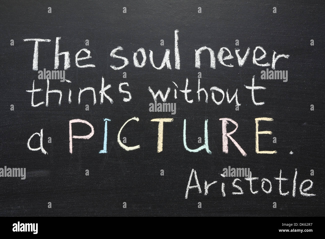 famous Aristotle quote 'The soul never thinks without a picture' handwritten on blackboard Stock Photo