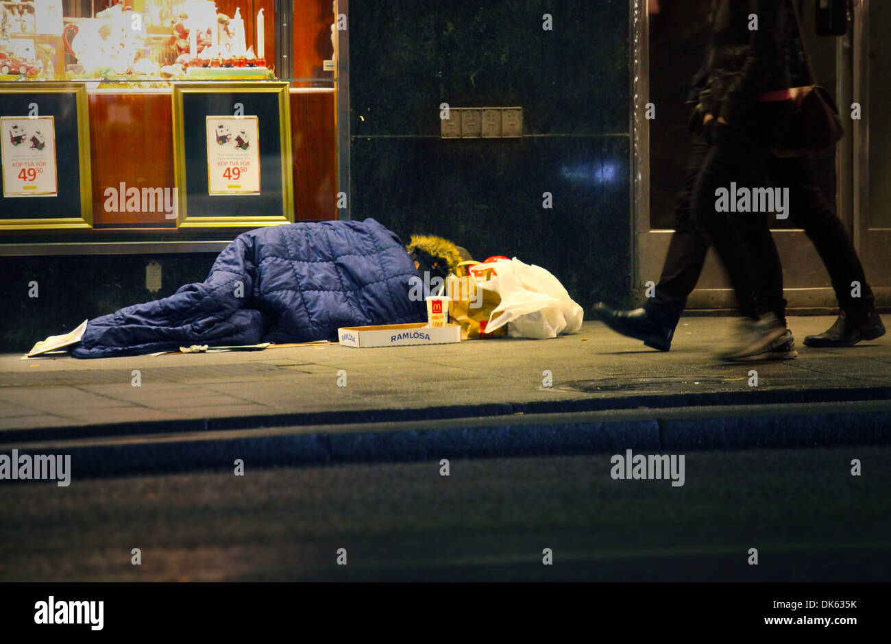 Homeless man sleeping on the street, Sweden Stock Photo Alamy