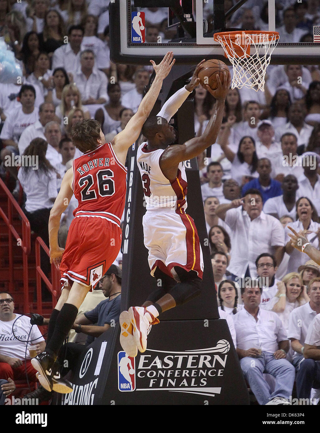 May 22, 2011 - West Palm Beach, Florida, U.S. -  MIAMI - AMERICAN AIRLINES ARENA - BULLS VS HEAT - R3G3 - The Heat's Dwyane Wade drives in for a layup beneath Bulls defender Kyle Korver during a playoff game Sunday night at American Airlines Arena. (Credit Image: © Damon Higgins/The Palm Beach Post/ZUMAPRESS.com) Stock Photo