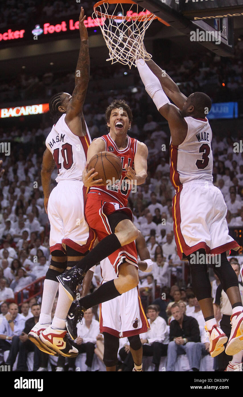 May 22, 2011 - West Palm Beach, Florida, U.S. -  MIAMI - AMERICAN AIRLINES ARENA - BULLS VS HEAT - R3G3 - The Bulls' Kyle Korver glides in for a layup beneath the Miami Heat's Udonis Haslem (l) and Dwayne Wade during a playoff game Sunday night at American Airlines Arena. (Credit Image: © Damon Higgins/The Palm Beach Post/ZUMAPRESS.com) Stock Photo