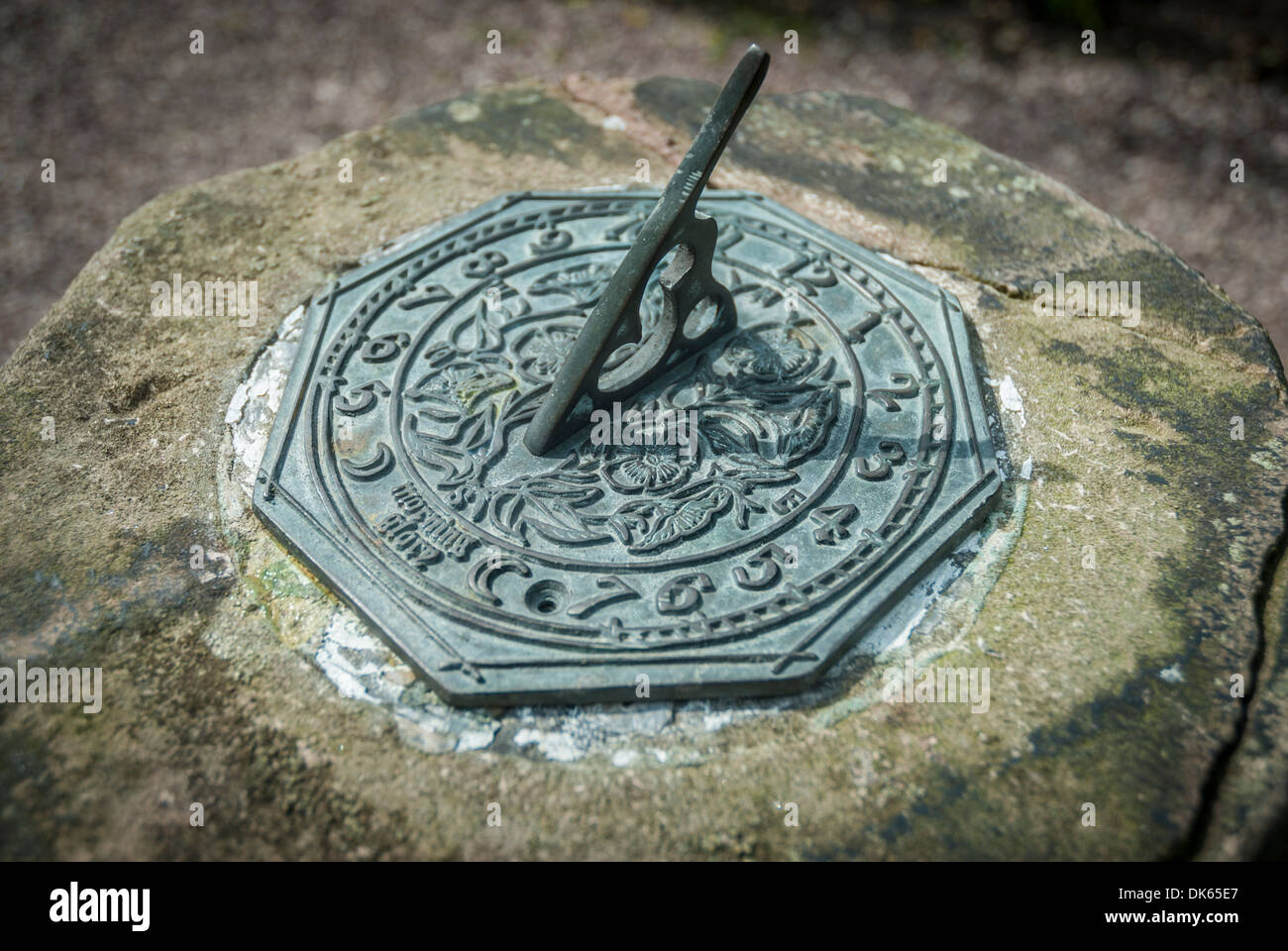 Old weathered stone garden sundial detail Stock Photo Alamy