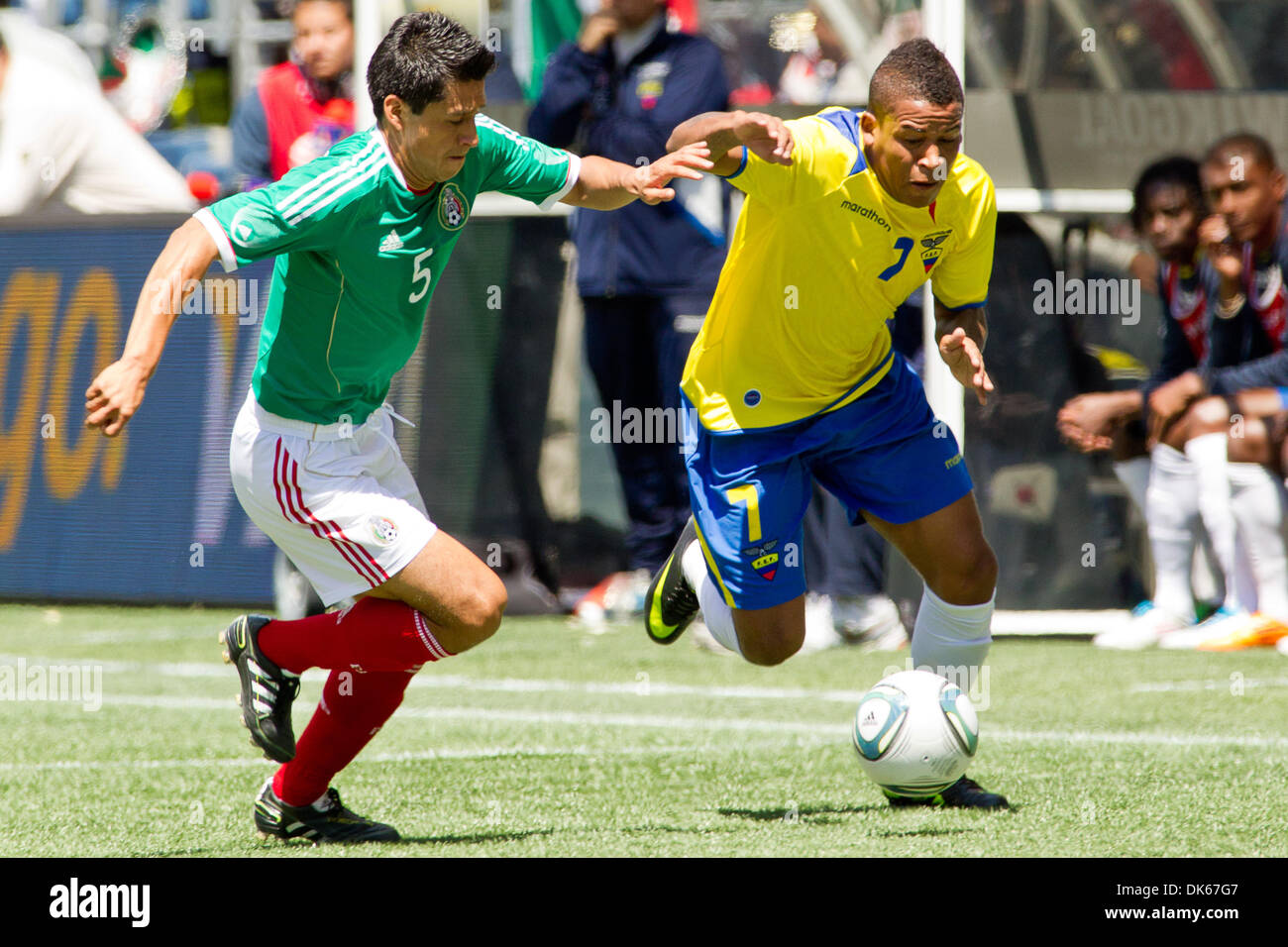 May 28, 2011 - Seattle, Washington, U.S - Mexico defender Ricardo Osorio (5) and Ecuador midfielder Michael Arroyo (7) race for the ball at Qwest Field in Seattle, Washington. The game ended in a 1-1 tie. (Credit Image: © Chris Hunt/Southcreek Global/ZUMApress.com) Stock Photo