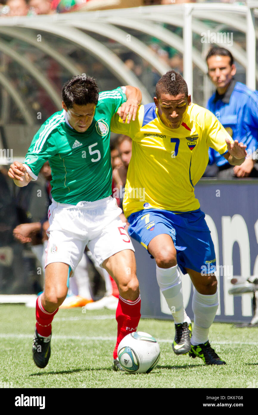 May 28, 2011 - Seattle, Washington, U.S - Mexico defender Ricardo Osorio (5) and Ecuador midfielder Michael Arroyo (7) fight for the ball at Qwest Field in Seattle, Washington. The game ended in a 1-1 tie. (Credit Image: © Chris Hunt/Southcreek Global/ZUMApress.com) Stock Photo