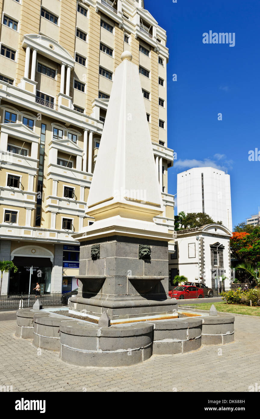 Obelisk water fountain with lion faces, Cathedral Square, Port Louis