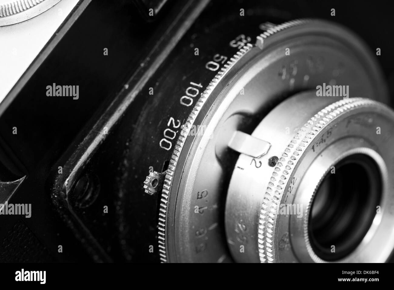 Closeup of old retro Cmena film camera lens Stock Photo