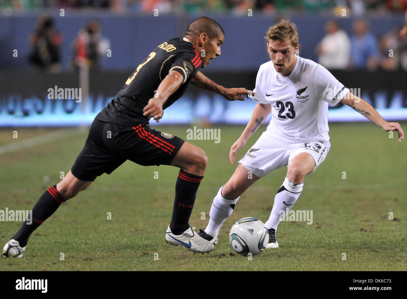 June 1, 2011 - Denver, Colorado, United States of America - Mexico's Carlos Salcido (3) tries to get around New Zealand's David Mulligan (23) at Invesco Field at Mile High. Mexico defeated New Zealand 3-0 (Credit Image: © Michael Furman/Southcreek Global/ZUMAPRESS.com) Stock Photo