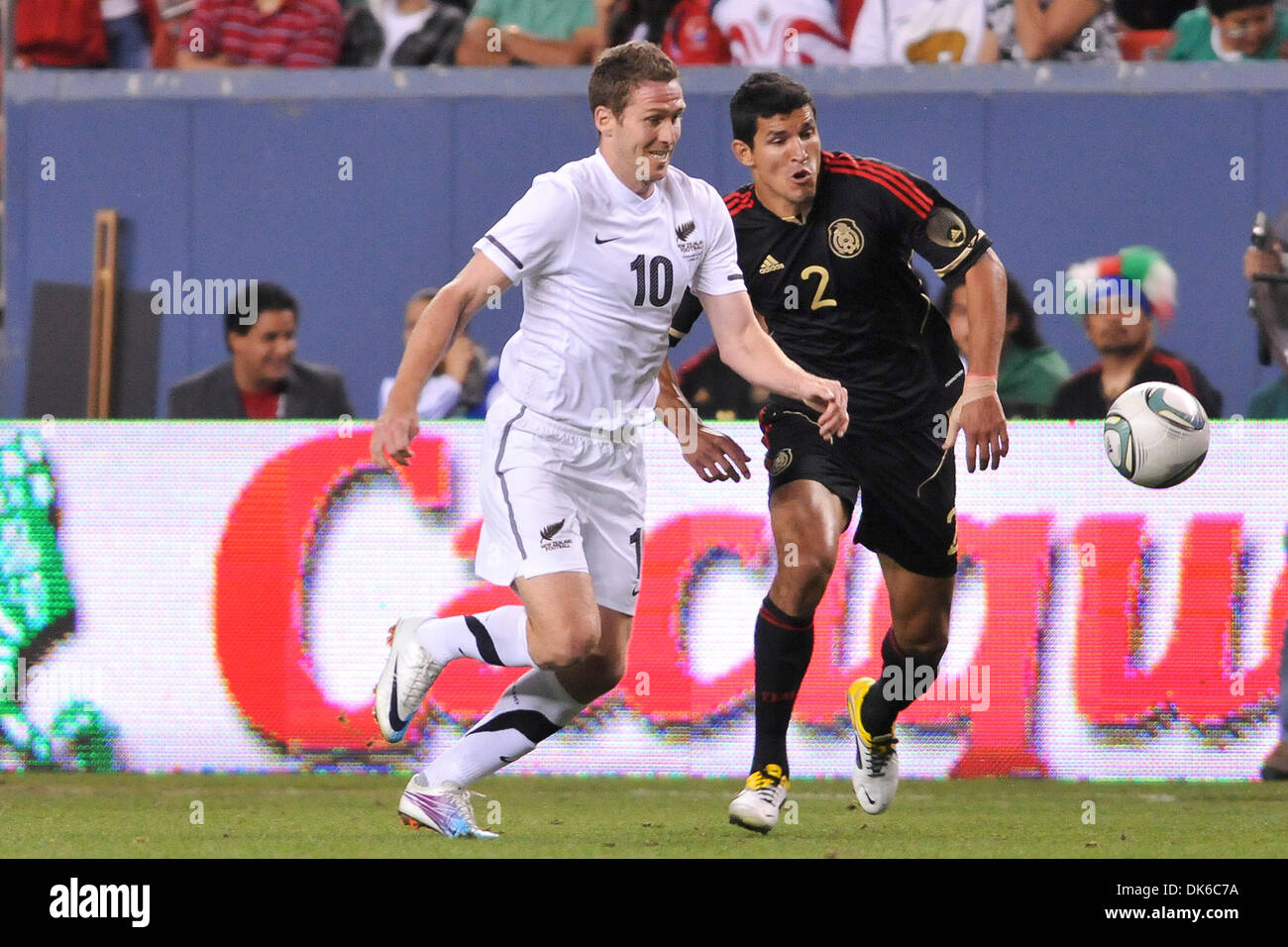 June 1, 2011 - Denver, Colorado, United States of America - Mexico's Francisco Rodriguez (2) and New Zealands Chris Killen (10) run for the ball at Invesco Field at Mile High. Mexico defeated New Zealand 3-0 (Credit Image: © Michael Furman/Southcreek Global/ZUMAPRESS.com) Stock Photo