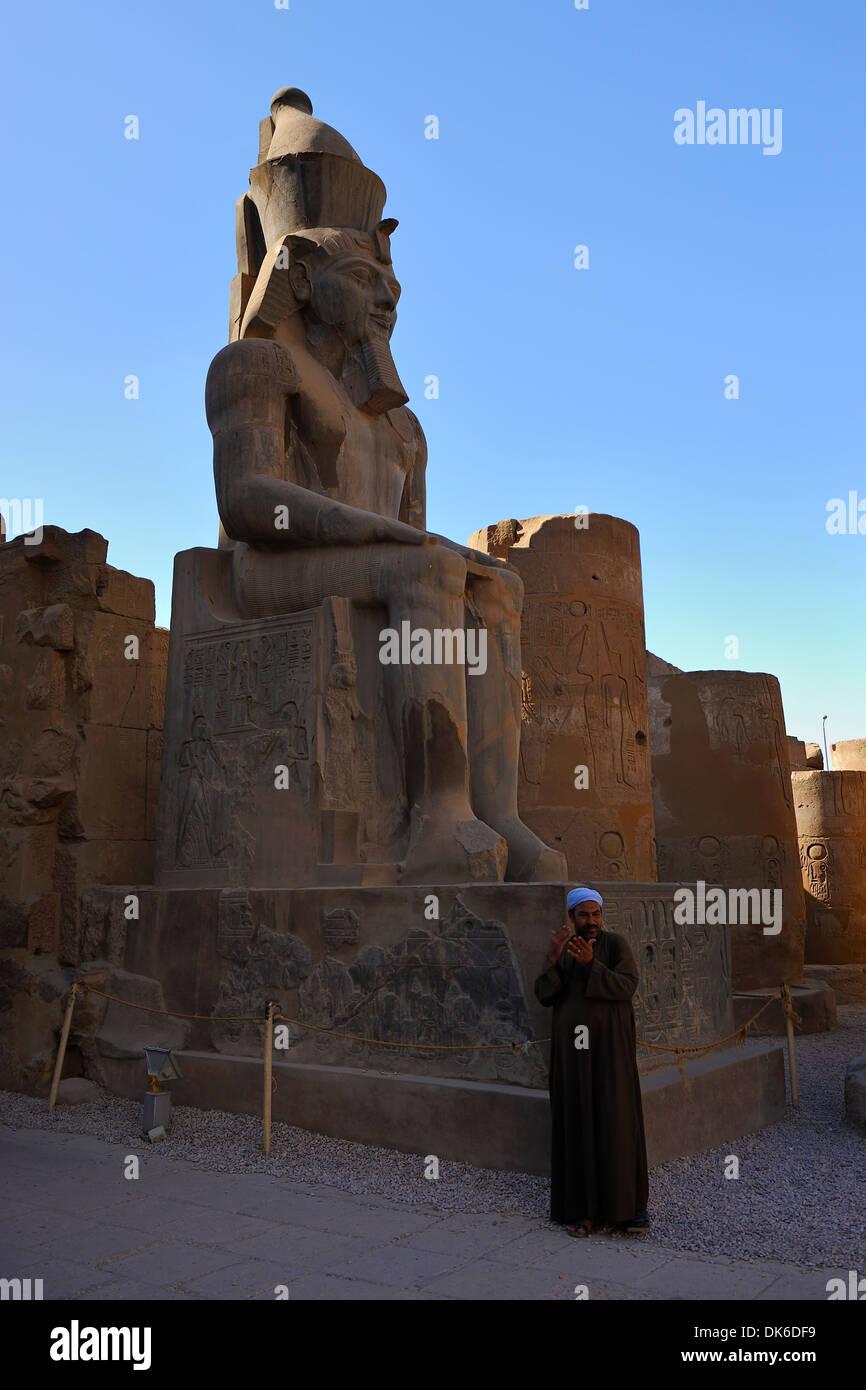 Seated statue of Ramesses II within Court of Ramesses II - Luxor Temple, Egypt Stock Photo