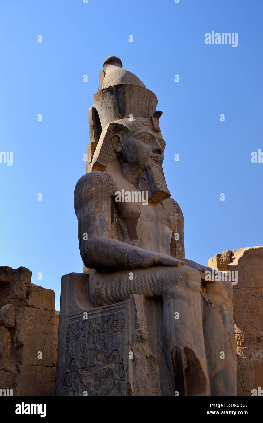 Seated statue of Ramesses II within Court of Ramesses II - Luxor Temple, Egypt Stock Photo