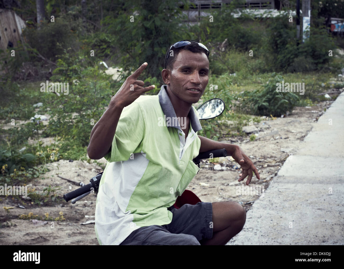 man makes hand signs Stock Photo - Alamy