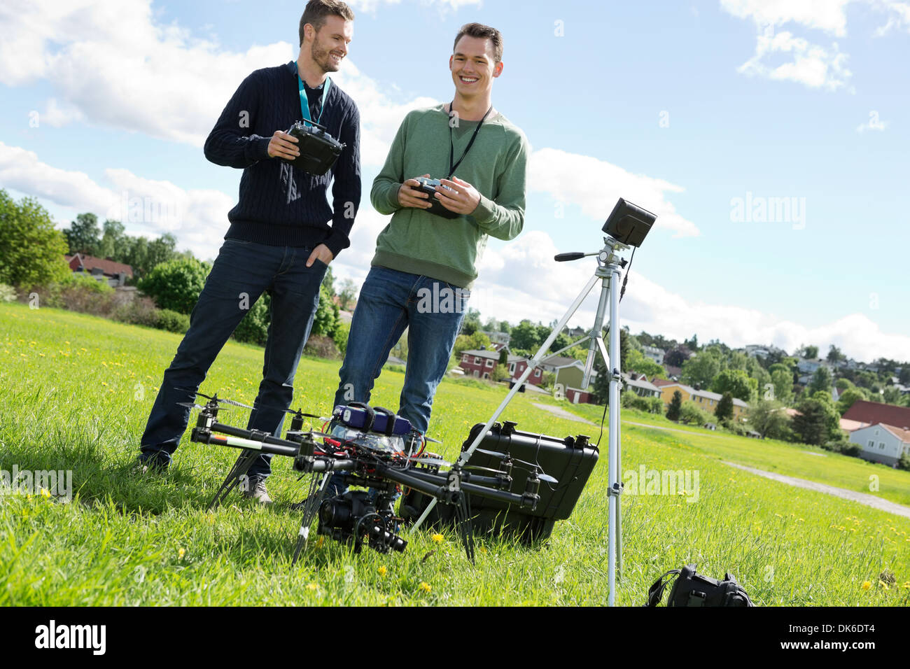 Technicians Holding Remote Controls Of UAV Stock Photo - Alamy