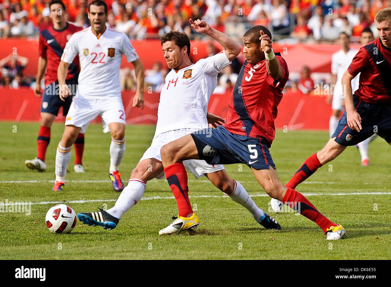 June 4, 2011 - Foxborough, Massachusetts, U.S - Spain midfielder Xabi Alonso (14) and USA defender Oguchi Onyewu (5) battle for the ball in the US 18 yard box. Spain defeats the United States in the international friendly 4 - 0 at Gillette Stadium. (Credit Image: © Geoff Bolte/Southcreek Global/ZUMAPRESS.com) Stock Photo