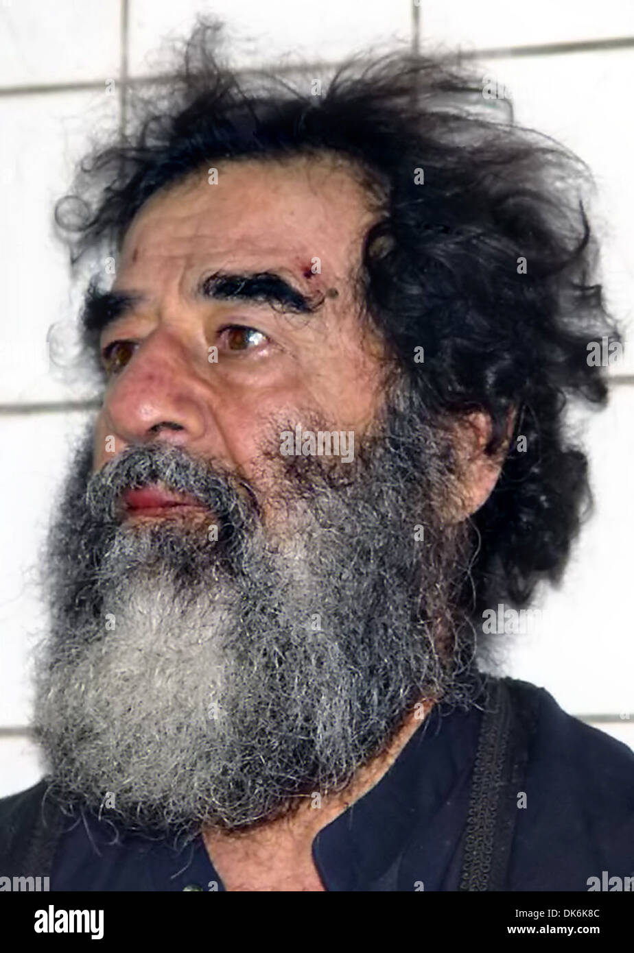 Former President of Iraq Saddam Hussein shortly after his capture by US Army forces December 14, 2003 in Tikrit, Iraq. Stock Photo