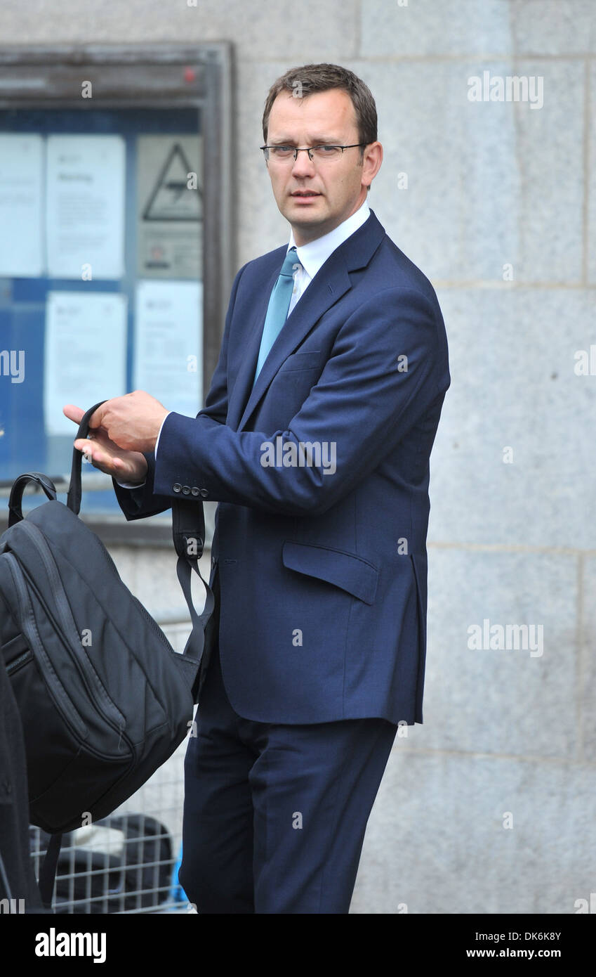 Andrew Coulson former editor leaves Central Criminal Court after a plea